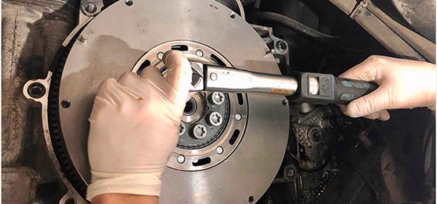 Audi rear main seal replacement image illustrating transmission-side access