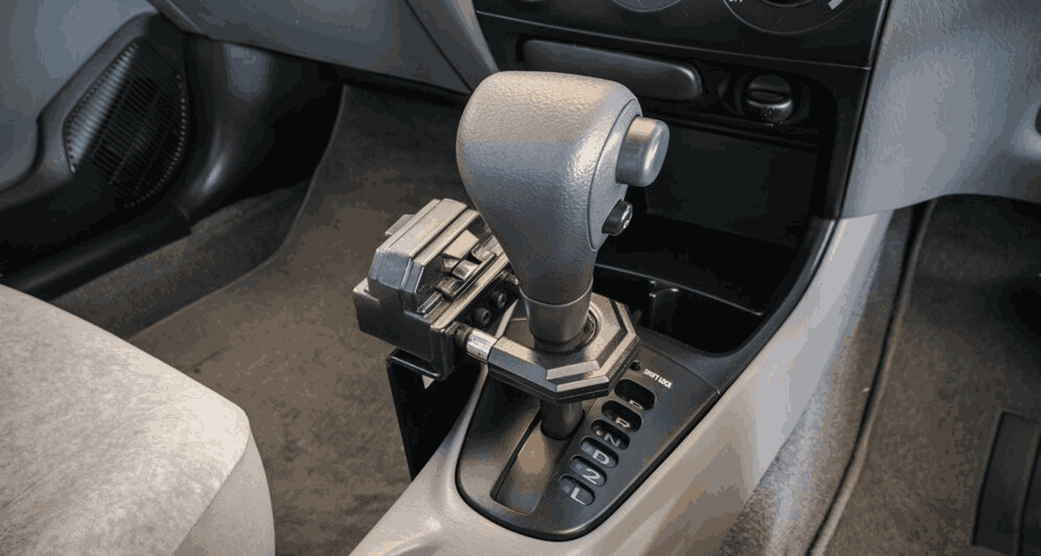Automatic gear selector and surrounding centre-console trim