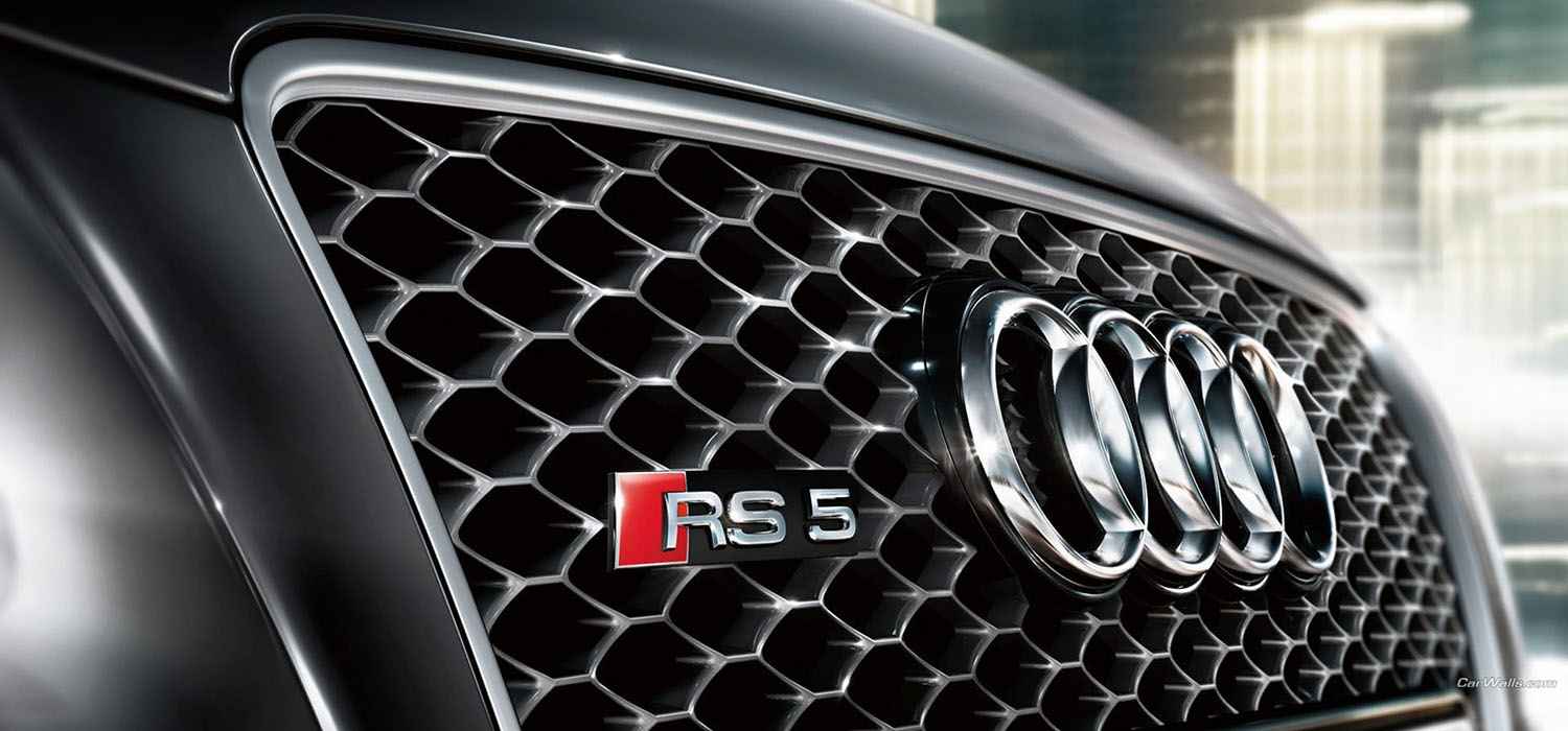 Close-up of an Audi honeycomb grille and surround